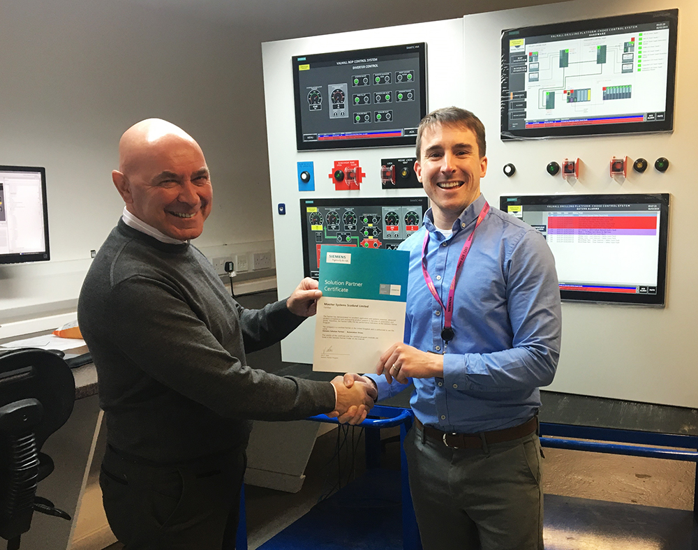 Siemens Solution Partner certificate being awarded